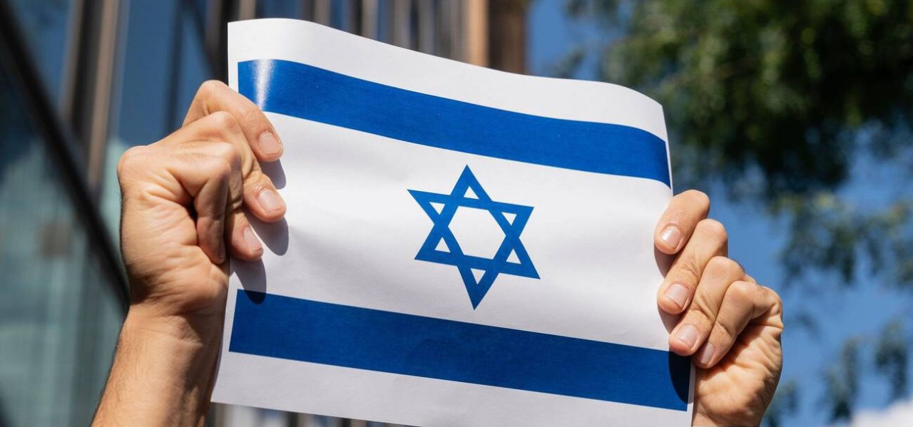 Protestor-Israel-flag-1280x599.jpg